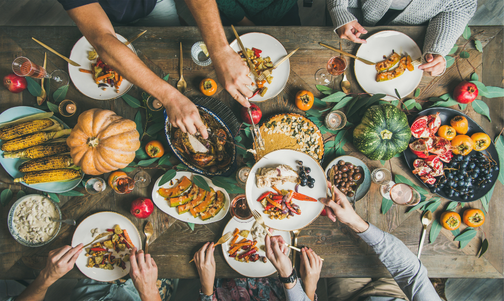 Holiday Catered meal from steakhouse with squash and harvest foods